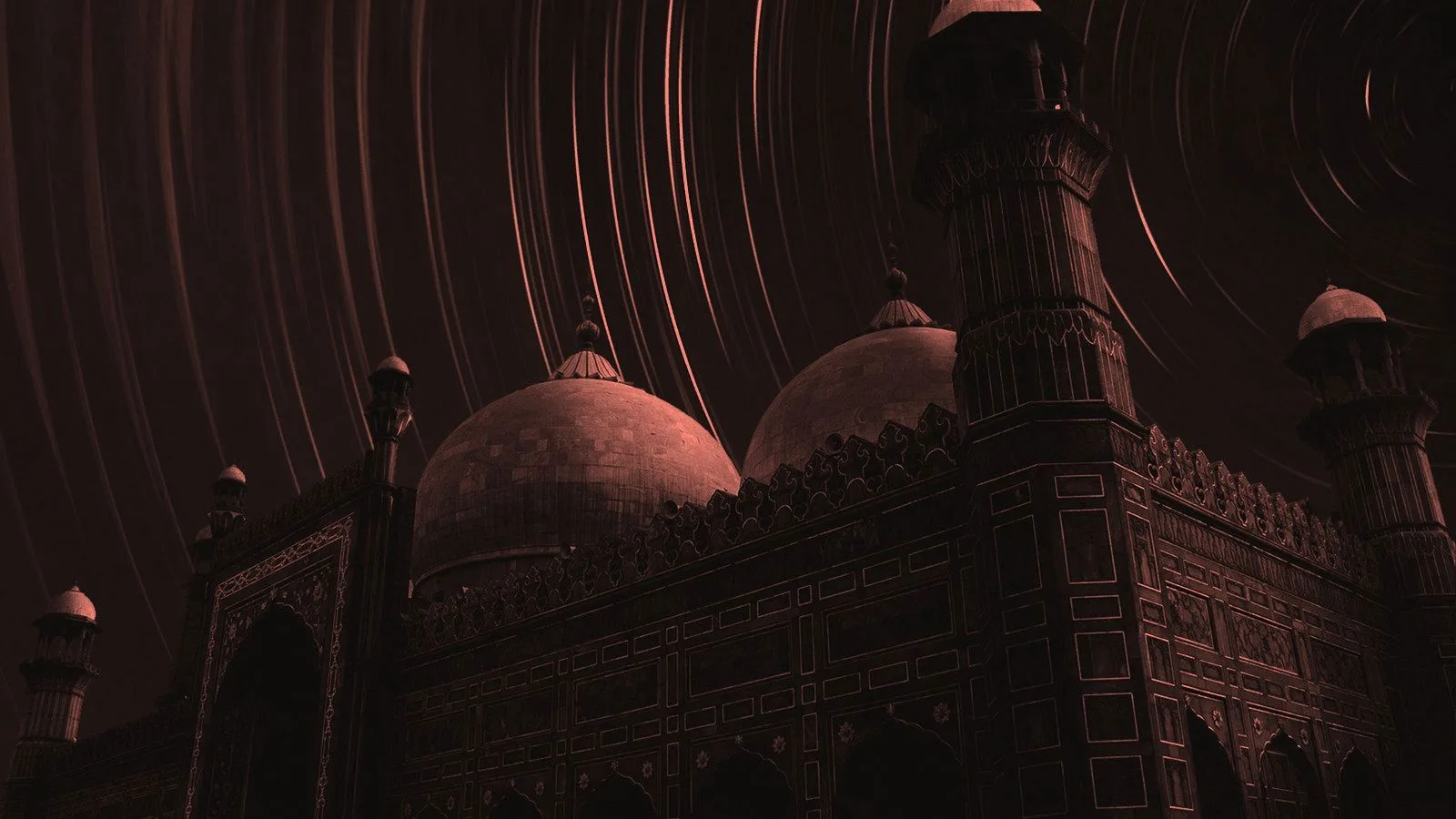 A mosque at night beneath long star trails in the sky
